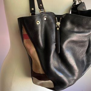 Burberry ladies handbag. Lightly used. Black leather with check on the side